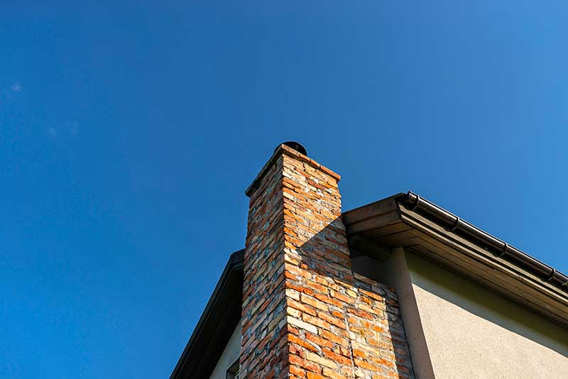 A red ceramic brick chimney