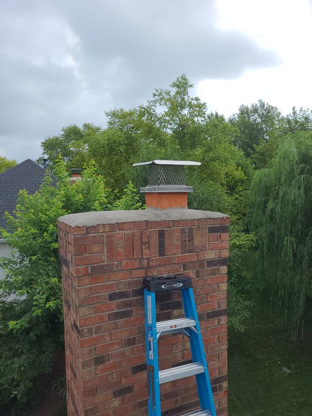 Mr. Martini after chimney repairs have been completed