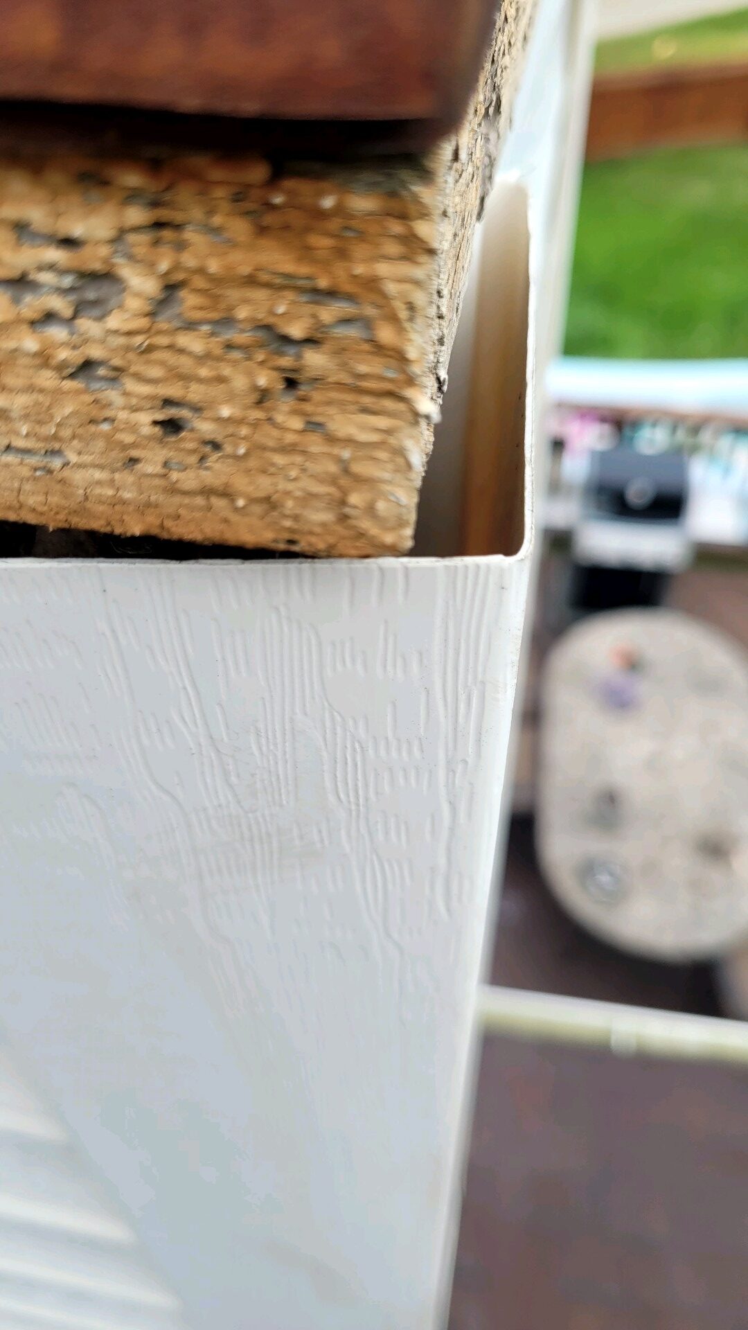 original photo of a white chimney chase with chimney cap