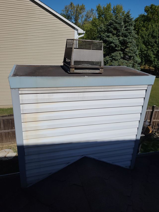 Roof view of a rusting chase cover