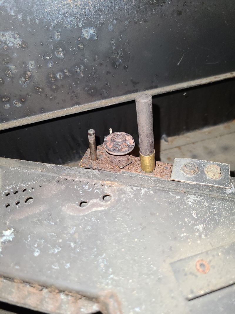 A rusted pilot light on Carl Showecker's gas fireplace
