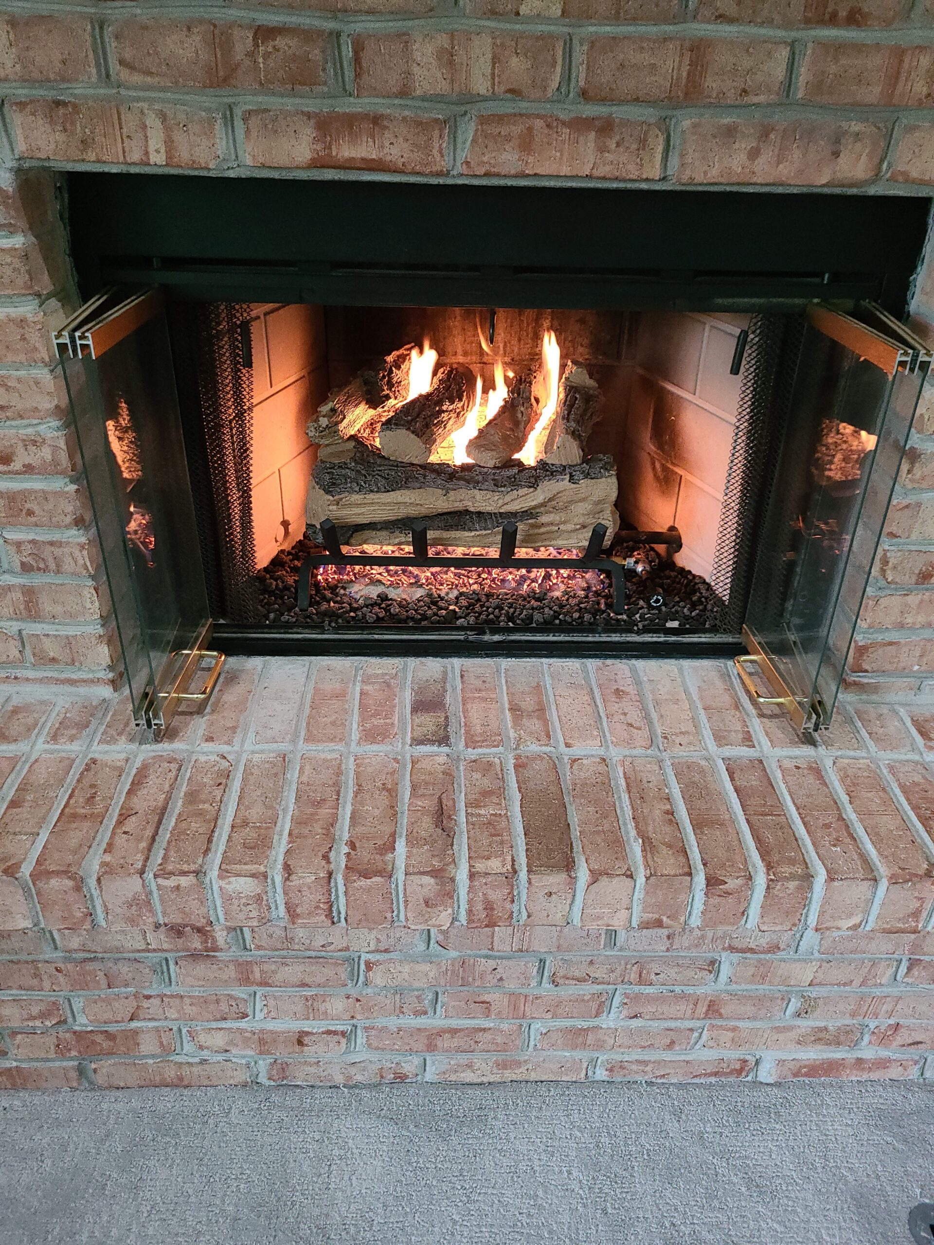 Original image by Beck's Chimney of client's restored gas fireplace.