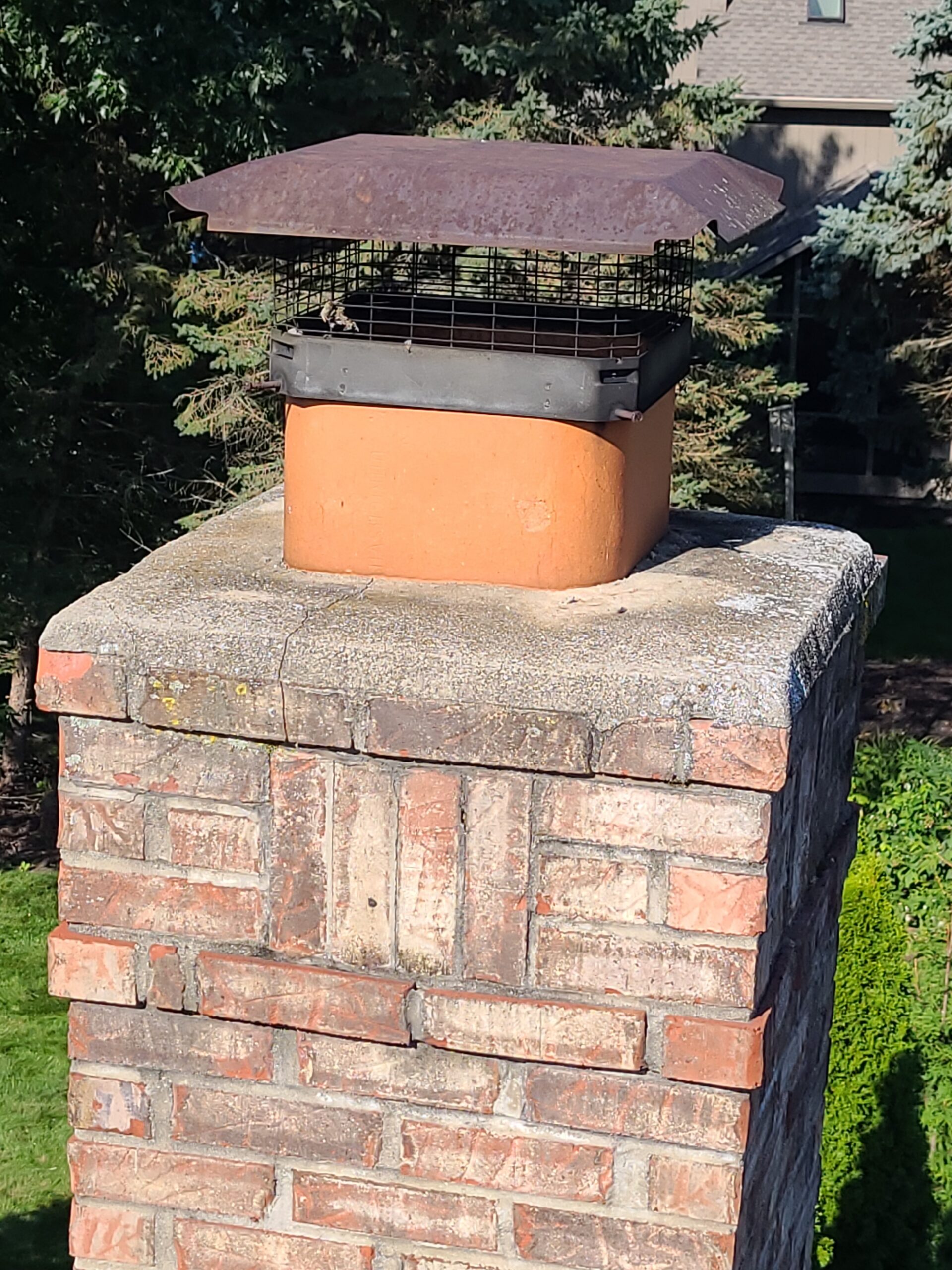 Image by Beck's Chimney Sweep showing a resurfaced and sealed mortar crown.